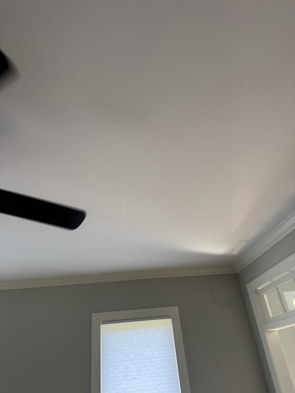 Drywall fully repaired and painted — seamless ceiling finish in Triangle NC home