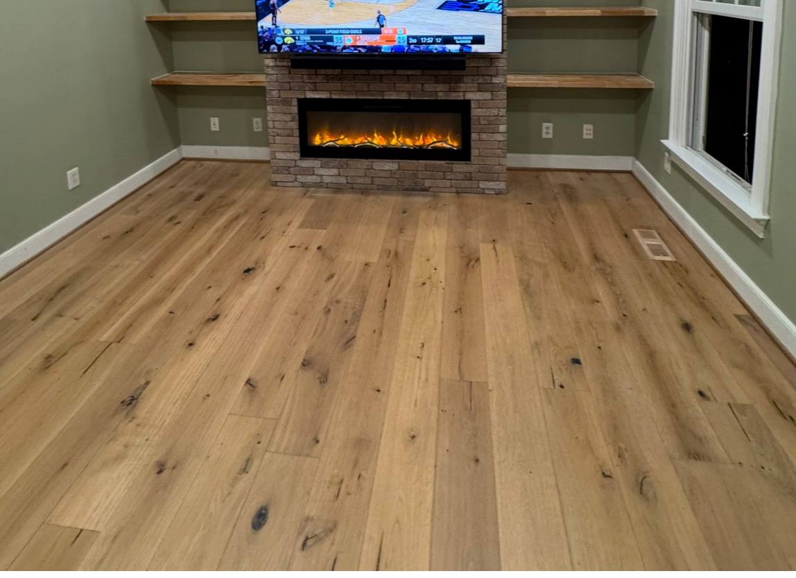 Wide-plank hardwood floor installation in Triangle NC living room