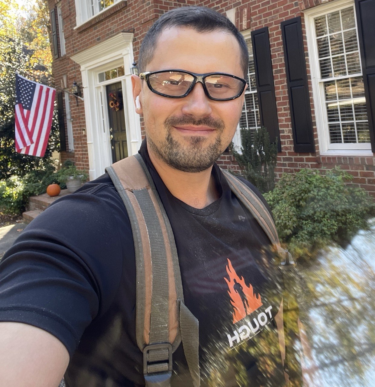 Mike, owner of Holly Springs Handyman, smiling with thumbs up at a job site in Holly Springs NC