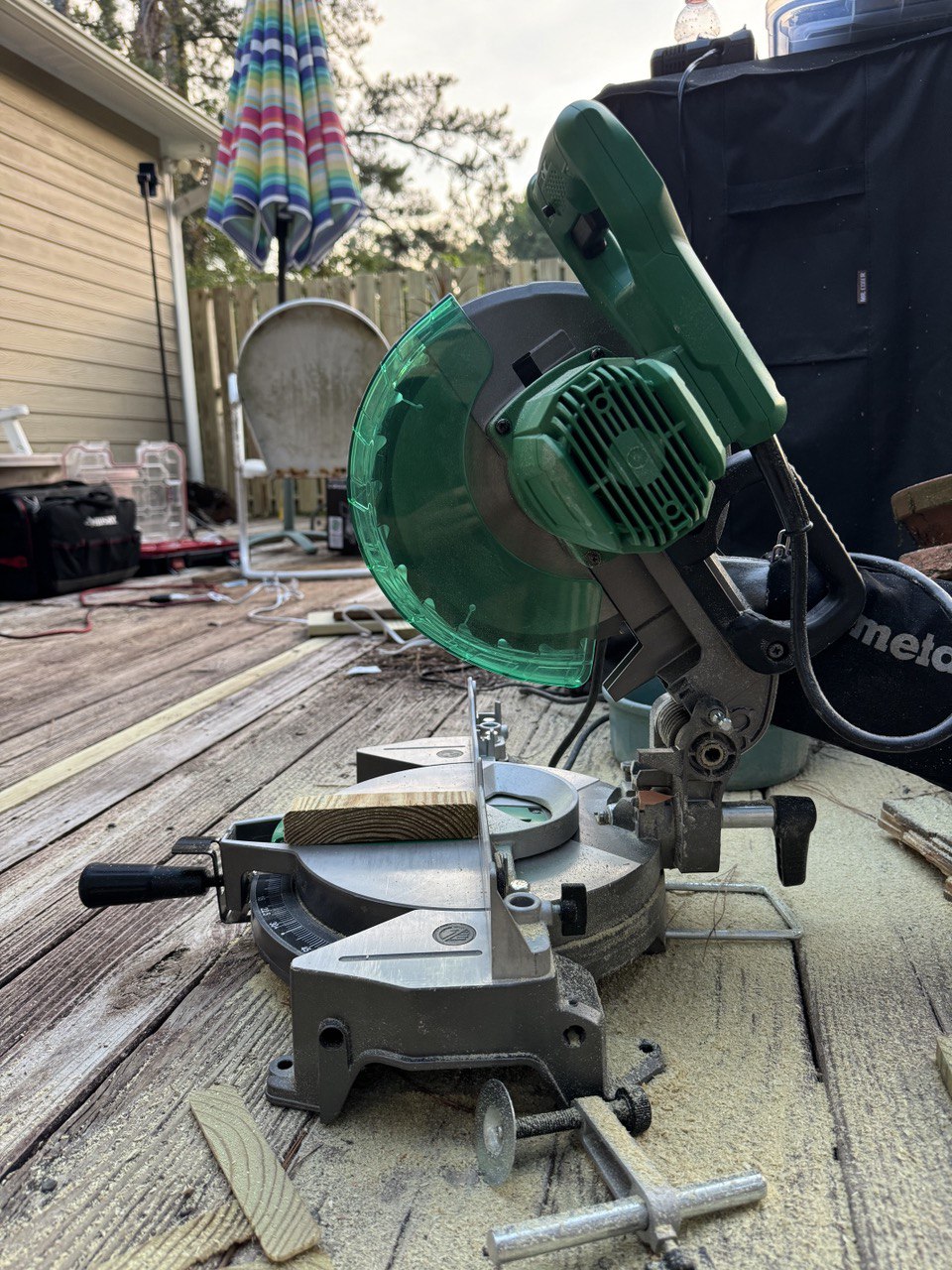 Mike, owner of Holly Springs Handyman, smiling at a completed deck job in Holly Springs NC