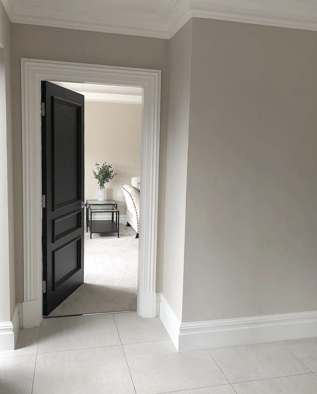 Interior painting with fresh neutral walls and crisp white trim in Triangle NC home