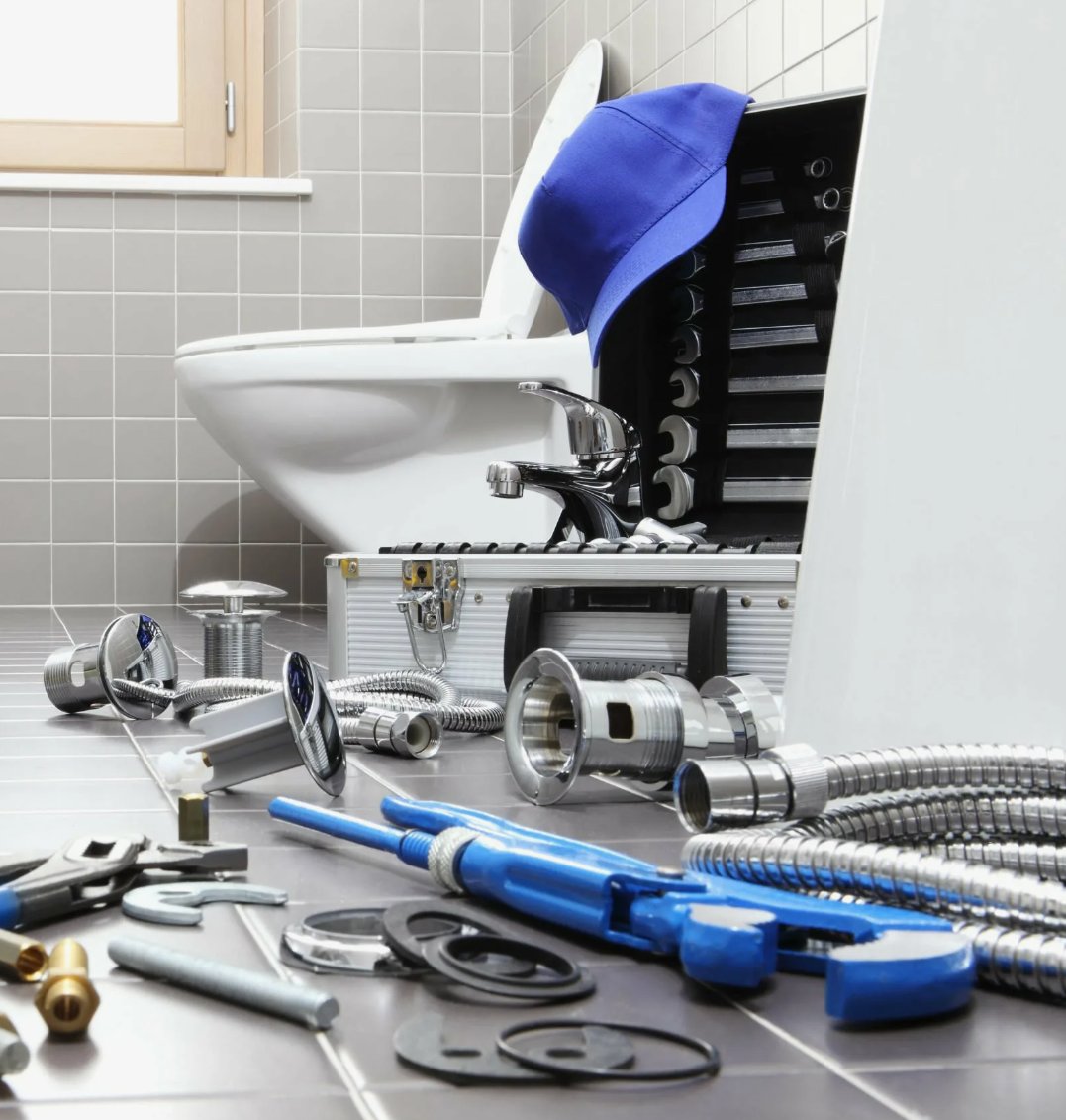 Plumbing tools and fixtures for bathroom toilet and faucet installation in Triangle NC